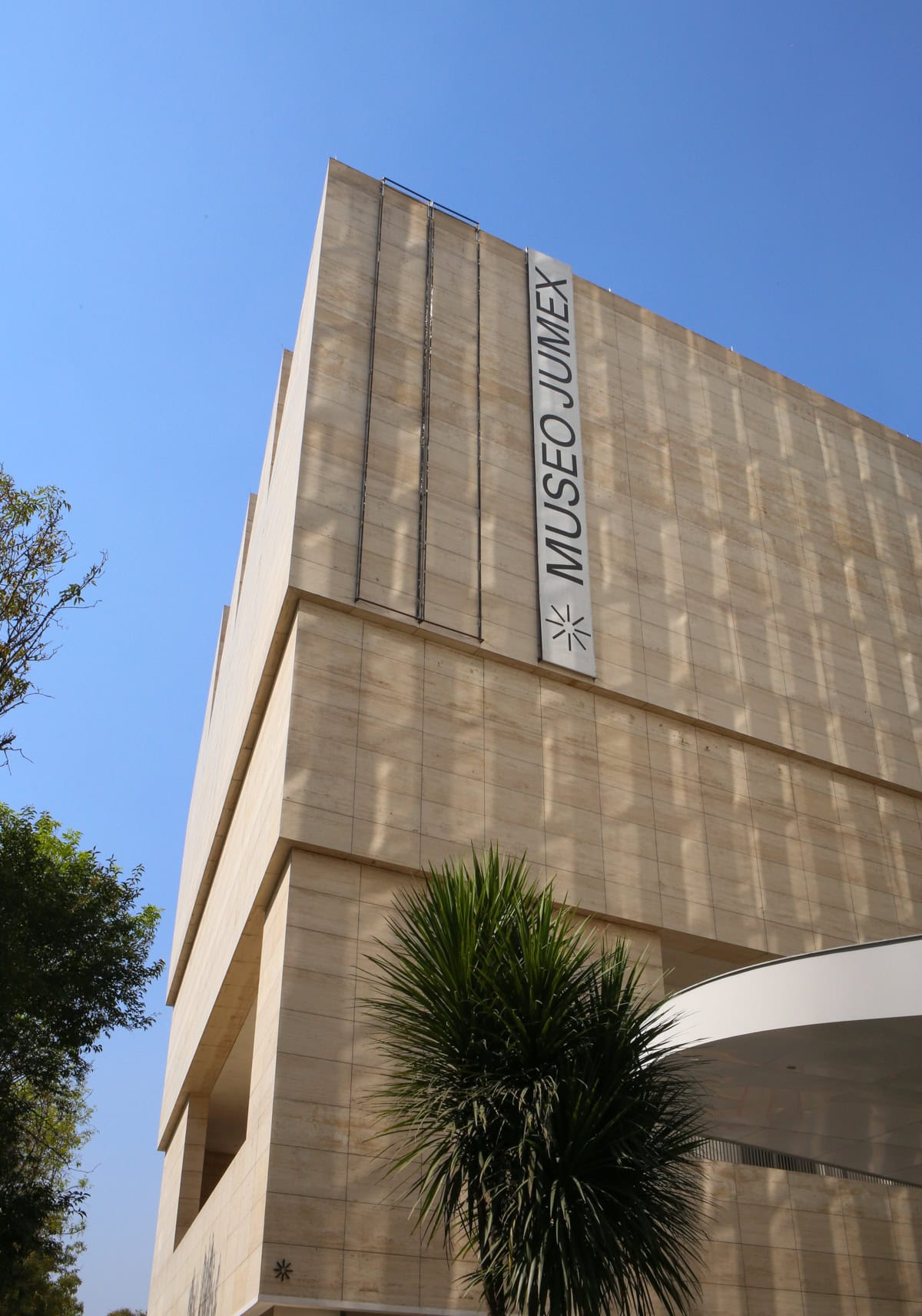 bright blue sky behind the museo jumex art museum in